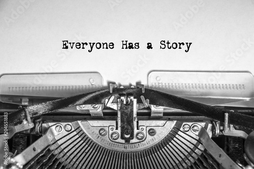 Everyone Has a Story typed text on a vintage typewriter. Close-up