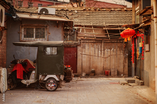 Canvas Print tuktuk in the courtyard of the house. Hutons, Beijing, China