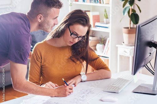 Foto Teamwork couple, small business, working from home together