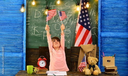 Children need private coach to keep up with the class. US flag and a blackboard. Tutor will require child to learn specific skill before advancing to level.