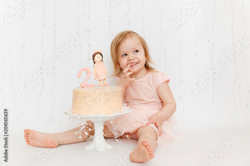 Cake for the second birthday. Portraits with cake. Cake Smash
