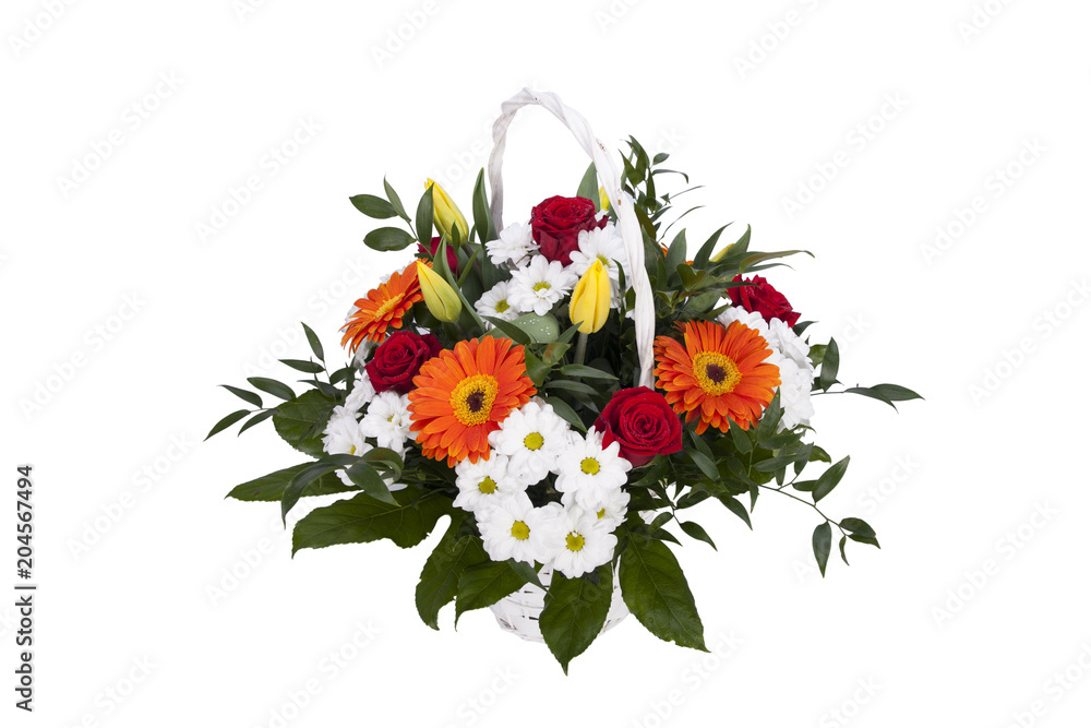 Obraz premium White basket with flowers. A bunch of colorful flowers for a birthday party. Woven basket, roses and tulips.