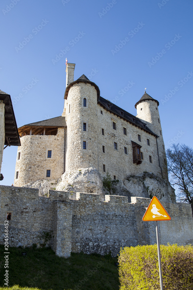 Ruins of a Gothic castle and hotel in Bobolice, Poland. Castle in the village of Bobolice, Jura Krakowsko-Czestochowska. Castle in eagle nests style. Built during the reign of  Kazimierz Wielki.