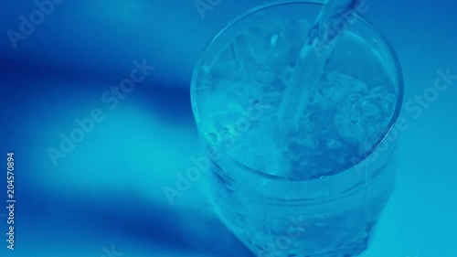 Wallpaper Mural fill water in a transparent glass. blue color its no efect, its a blue lamp
 Torontodigital.ca