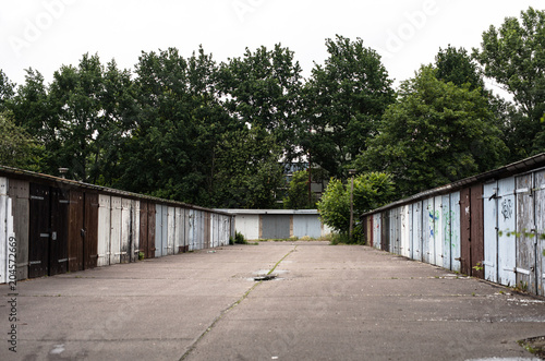 garages in the yard in an apartment building photo