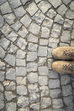 Paving stones with shoes