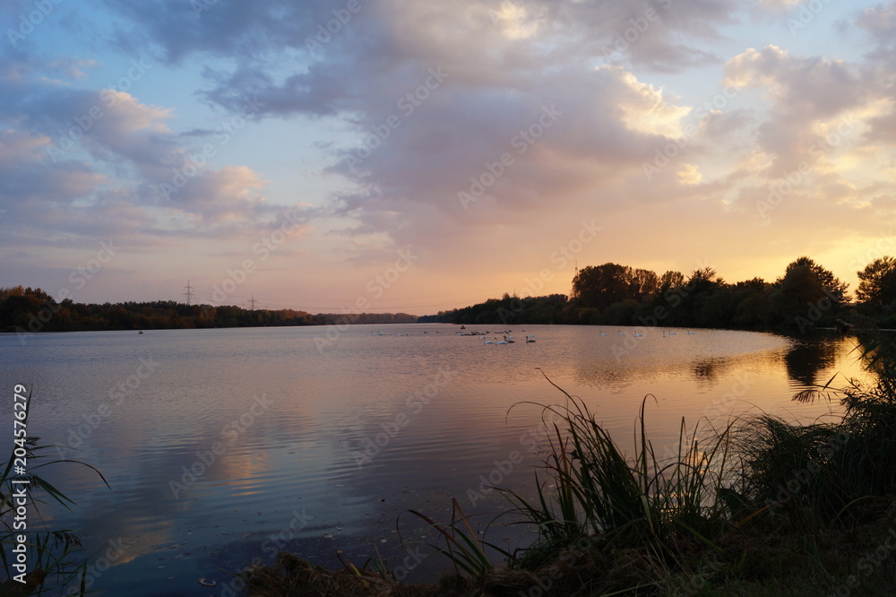 crimson sunset over the river Isar