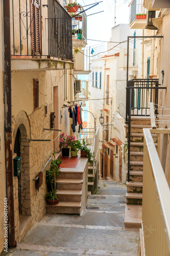 Italy  Foggia  Apulia  SE Italy  Gargano National Park  Vieste. Old city  residential homes along pedestrian streets. Laundry drying.