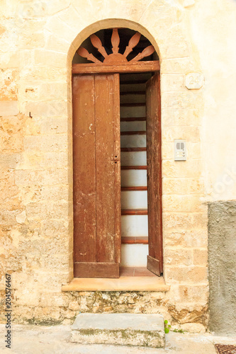 Italy, Foggia, Apulia, SE Italy, Gargano National Park,Vieste. Old city, door with steep staircase. © Emily_M_Wilson