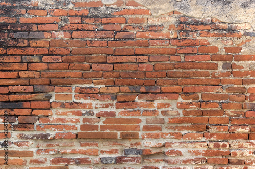 old cracked brick wall as background