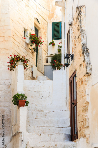Italy, SE Italy, Ostuni. Narrow, arched old town . DoorsBlue Doorways.The "White City."  November 23, 2016 © Emily_M_Wilson