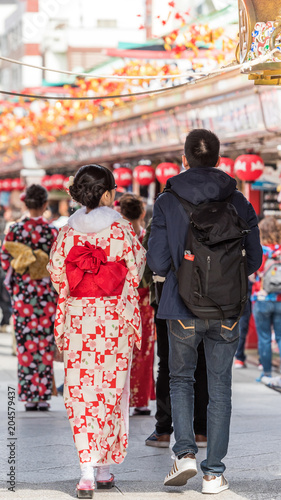 Photography The girl in a kimono on a city street, Tokyo, Japan