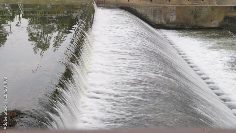 Flowing water at small dam
Flowing water at small dam