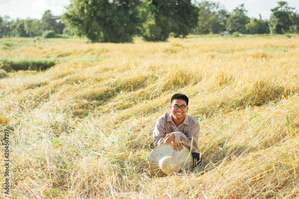 Brown Skin Farmer And His Rice Field Brown Skin Farmer And His Rice Field