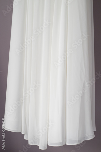 Detail of pearl silk in bride dress