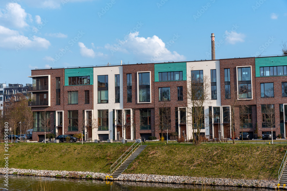 Red and white brickwall serial houses seen in Berlin, Germany Red and white brickwall serial houses seen in Berlin, Germany