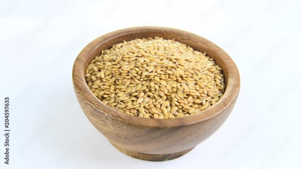 flax seeds in wooden bowl ,rotation
flax seeds in wooden bowl ,rotation
