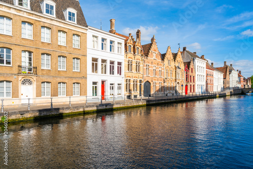 View of a canal and old colorful buildings in Bruges, Belgium