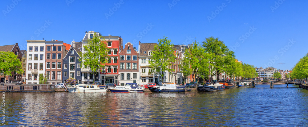 Panorama View Of Houses Near Canals In Amsterdam