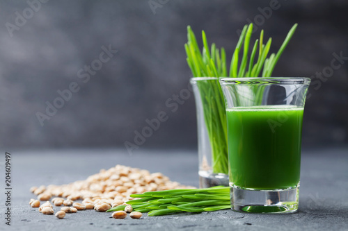 Canvas Print Natural wheat grass juice. Detox, diet and superfood concept.