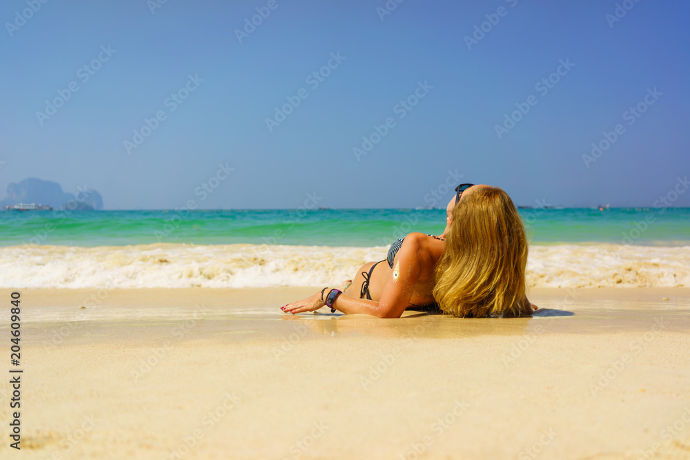 woman resting at the tropical Thailand Railay beach woman resting at the tropical Thailand Railay beach