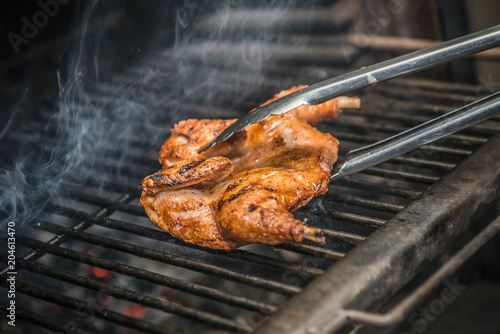Whole Baby Chicken Being Prepared in Josper Grill