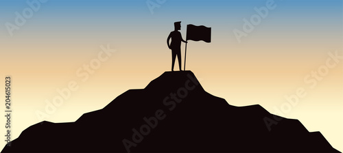 Man holding flag on top mountain. Conception of winner, success and leadership.