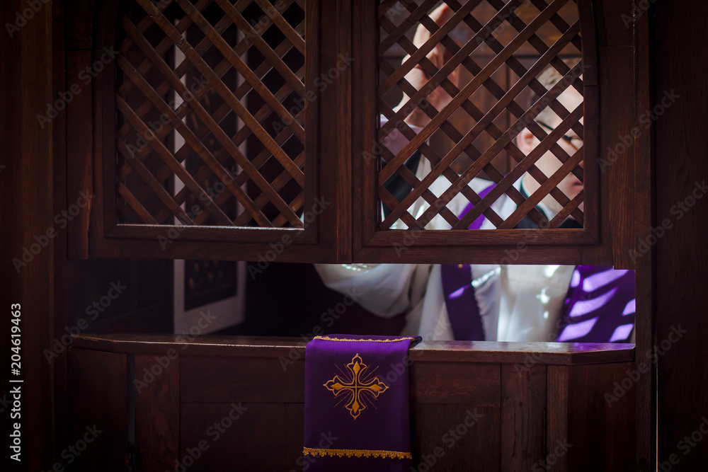 Fototapeta premium Spowiedź konfesjonał