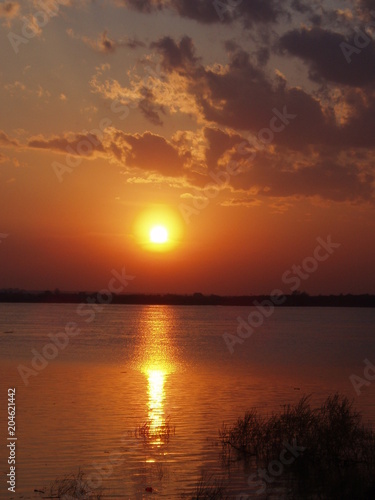 beauty in Nature cloud - sky idyllic lake Nature no people non-urban scene orange color outdoors Reflection scenics - nature sky sun Sunlight sunset tranquil scene Tranquility water waterfront