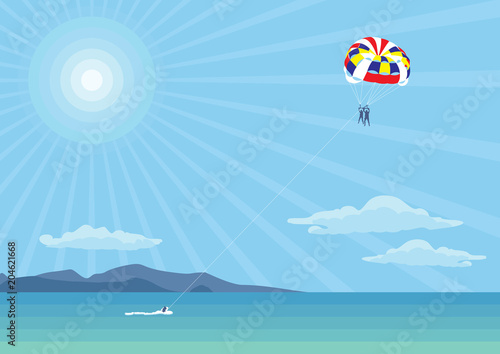 Parachute over the sea. Outdoor activities over the sea and mountains.