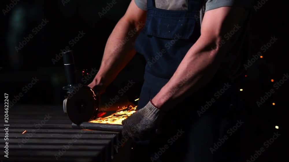 industrial engineer working on cutting a metal and steel with compound ...