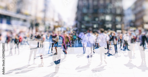Photography Crowd of anonymous people walking on busy vienna city street