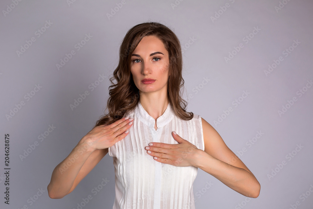 portrait of girl in white jacket standing on white background portrait of girl in white jacket standing on white background