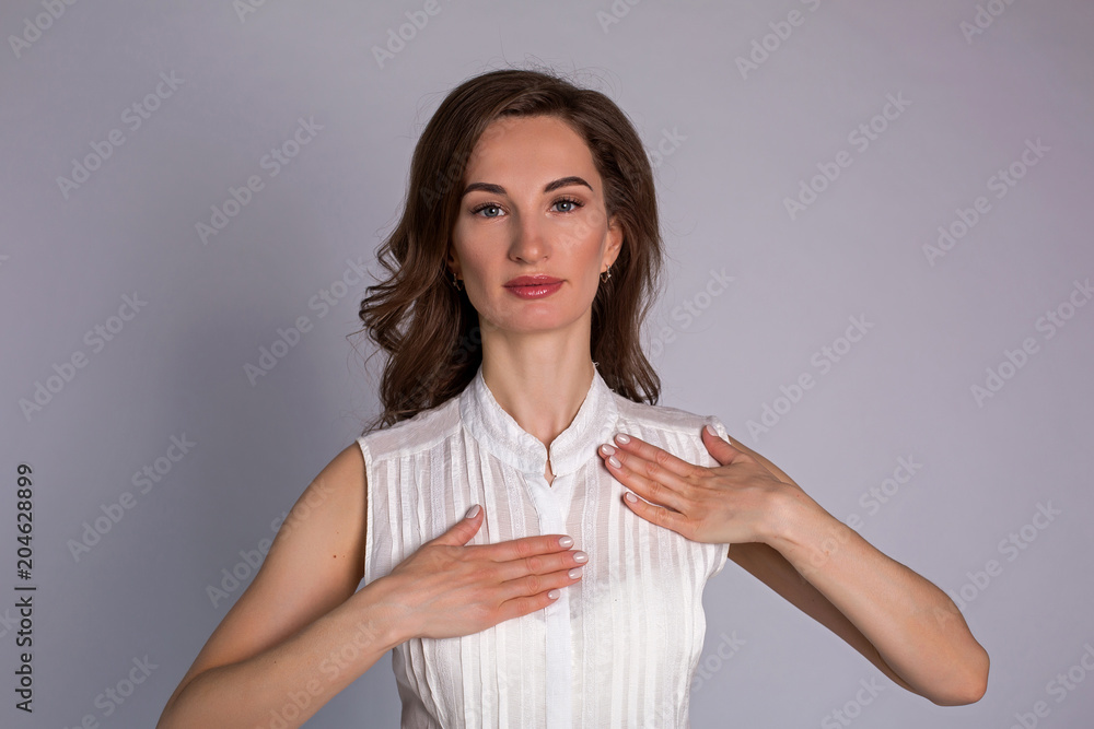 portrait of girl in white jacket standing on white background portrait of girl in white jacket standing on white background