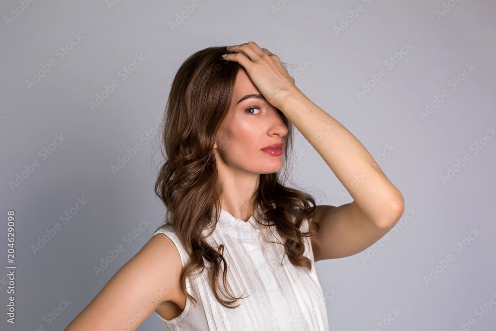 young woman makes herself a massage complex of exercises young woman makes herself a massage complex of exercises