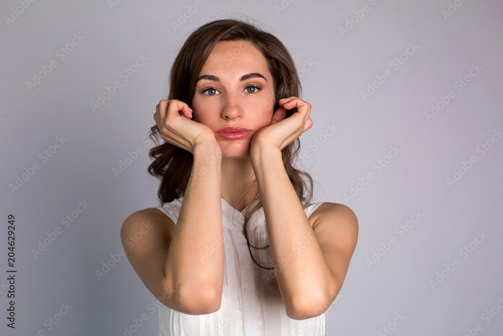 young woman makes herself a massage complex of exercises young woman makes herself a massage complex of exercises