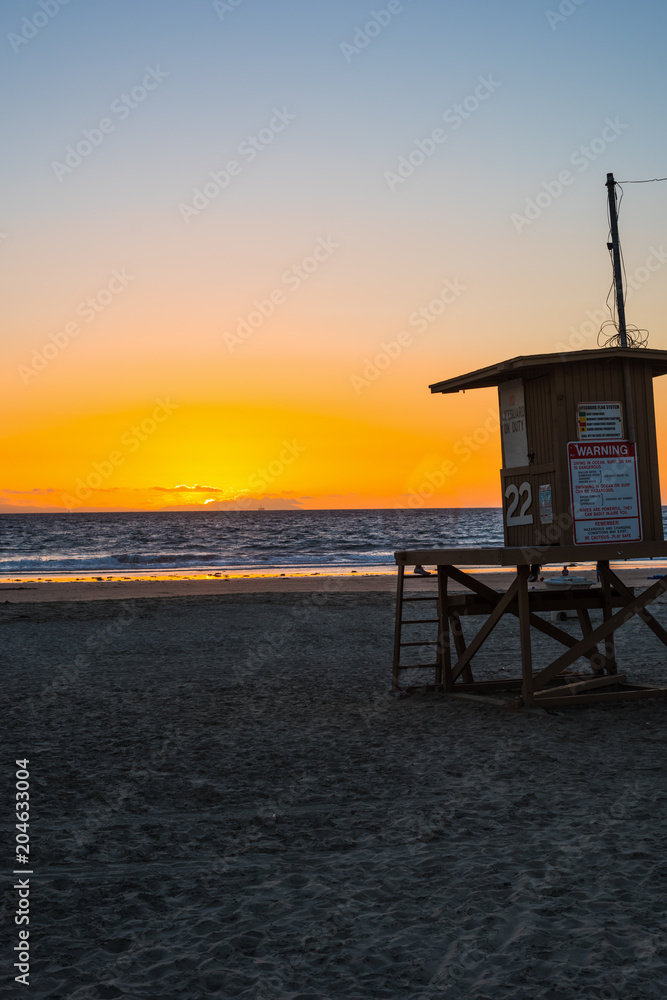 Lifeguard hut in Newport Beach at sunset