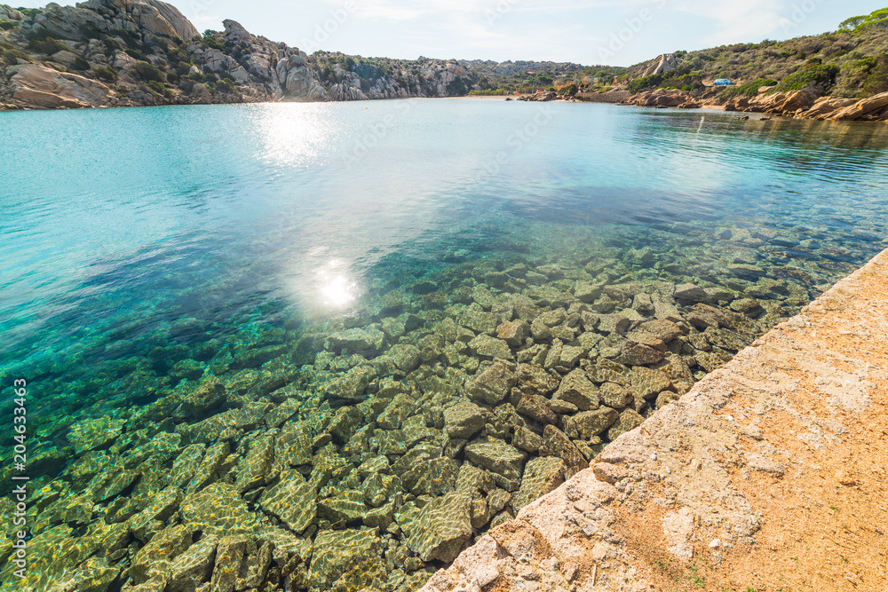 Clear water in Spalmatore beach in La Maddalena Clear water in Spalmatore beach in La Maddalena