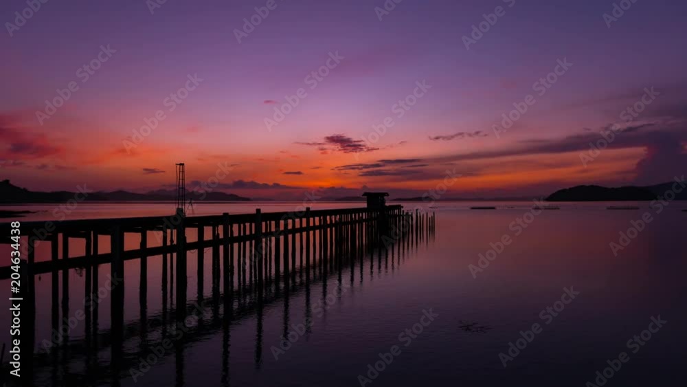 old small jetty in to the sea in sunrise or sunset evening time old small jetty in to the sea in sunrise or sunset evening time