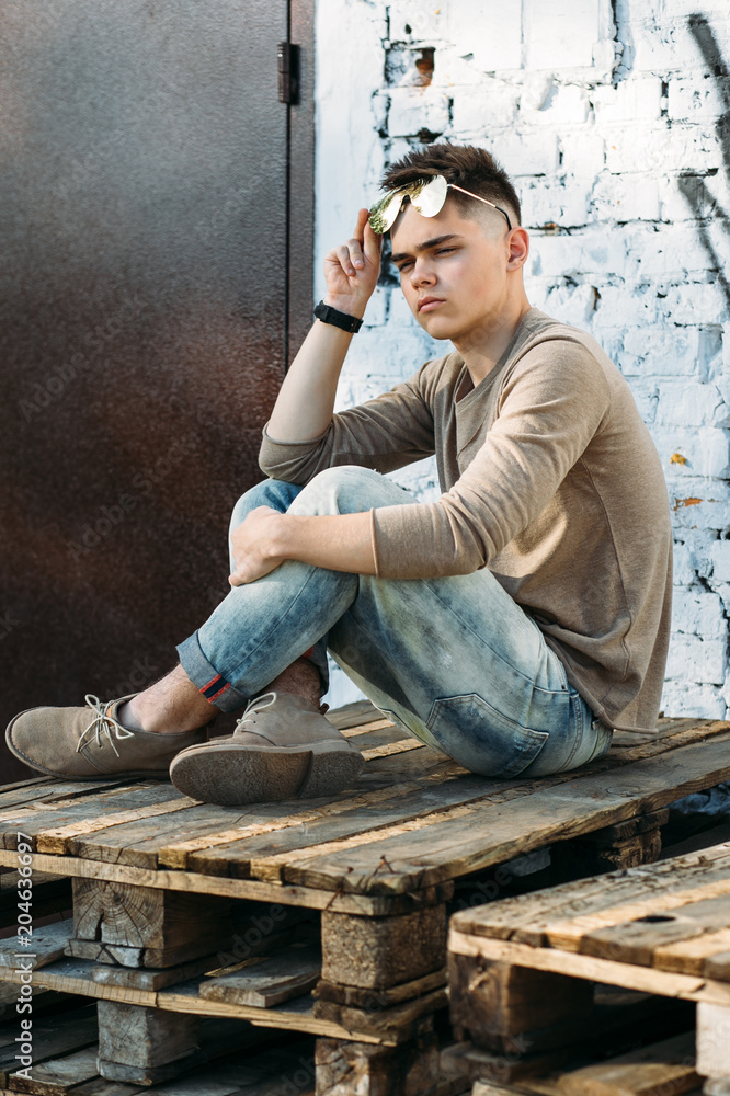 Teenager in casual style clothing Teenager in casual style clothing