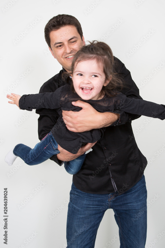 cheerful father playing with daughter isolated on white cheerful father playing with daughter isolated on white