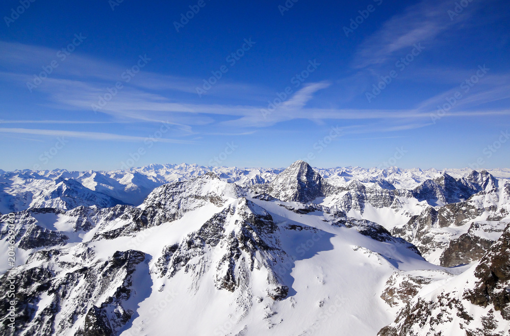 gorgeous winter mountain landscape with the famous Piz Linard in the Swiss Alps