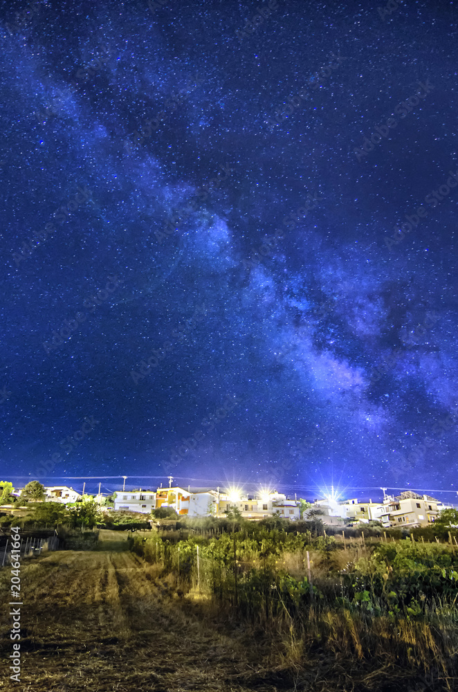 Archanes Town, Crete Island - Greece. The milky way above Archanes town