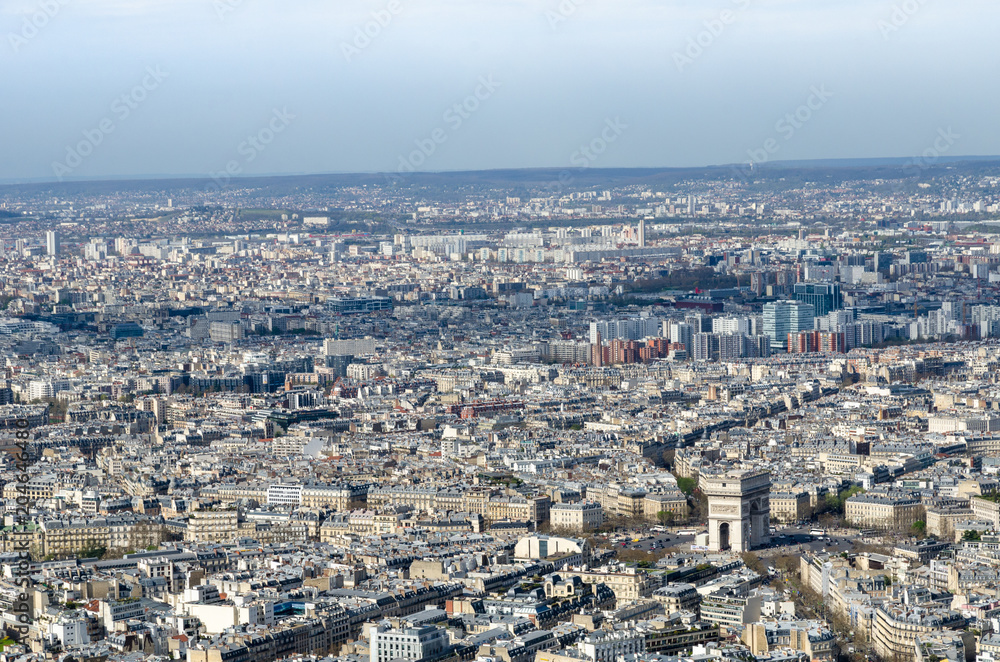 View of the city of Paris, including the Arc de Triumph, from the Eiffel Tower