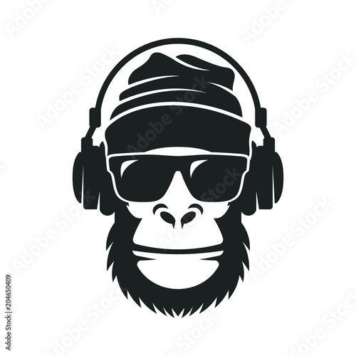 Gorilla in a knitted hat, sunglasses and headphones. Cool Monkey