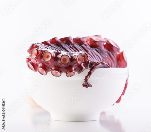 Beautiful octopus tentacle in the white bowl