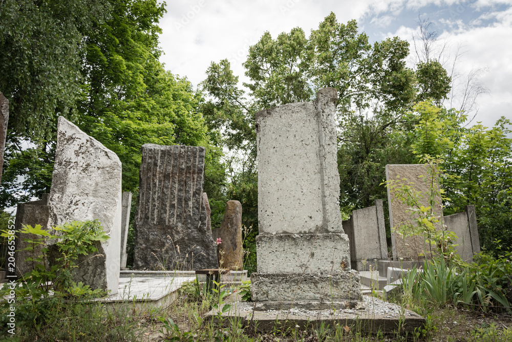 Memorial stone of granite slabs in the Jewish cemetery Memorial stone of granite slabs in the Jewish cemetery