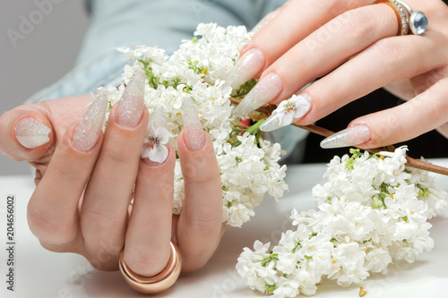 Amazing 3d Flower nail art design on tinted glass nails.