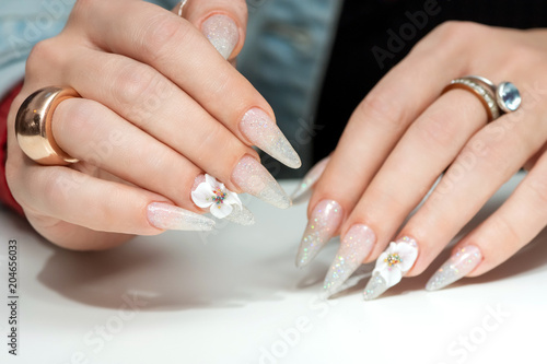 Amazing 3d Flower nail art design on tinted glass nails.