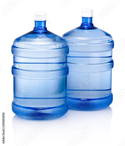 Two big blue plastic cooler bottle for potable water isolated on a white background